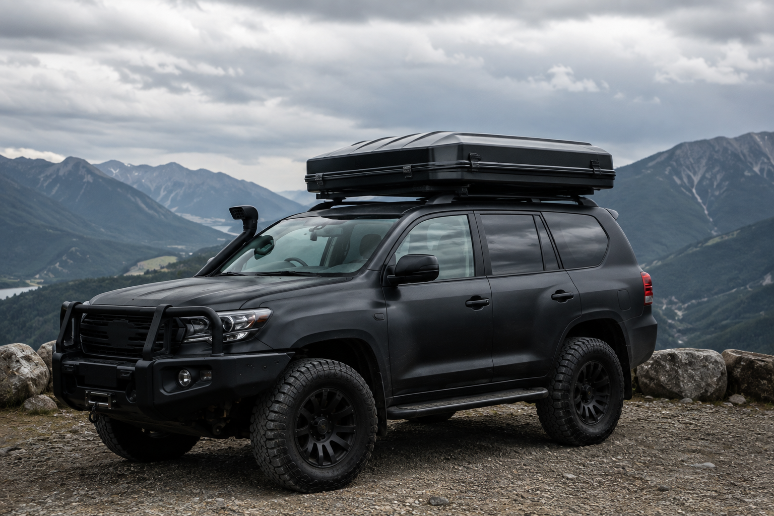 Closed hard shell rooftop tent side view